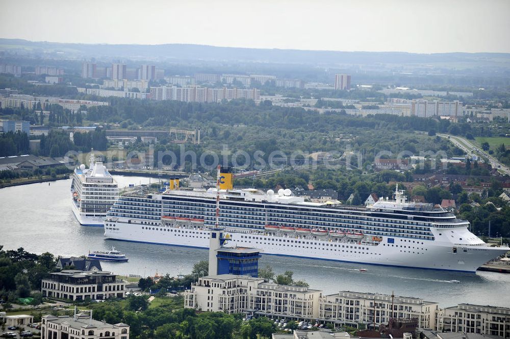 Rostock - Warnemünde from the bird's eye view: Blick auf den Kreuzfahrt - Hafen in Warnemünde mit dem Passagierschiff COSTA ATLANTICA . Die Costa Atlantica ist ein Kreuzfahrtschiff der Reederei Costa Crociere. Das Einsatzgebiet des 290m langen Luxusliners ist im Sommer das Nordland und die Ostsee. View of the Cruise - Port of Rostock - Warnemünde with the passenger ship COSTA ATLANTICA. The Costa Atlantica is a cruise ship for Costa Crociere.