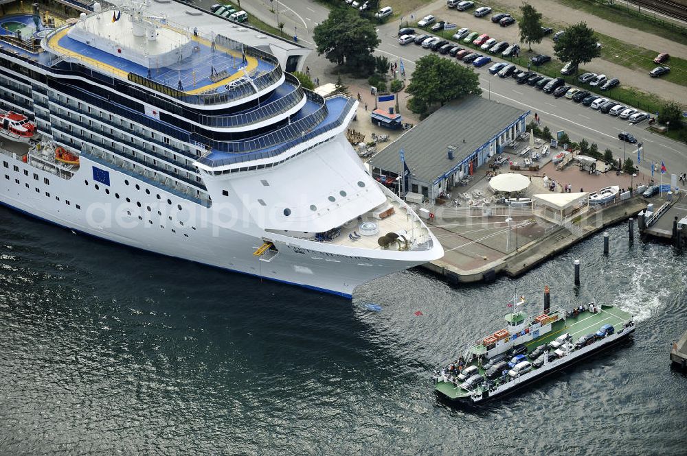 Aerial photograph Rostock - Warnemünde - Blick auf den Kreuzfahrt - Hafen in Warnemünde mit dem Passagierschiff COSTA ATLANTICA . Die Costa Atlantica ist ein Kreuzfahrtschiff der Reederei Costa Crociere. Das Einsatzgebiet des 290m langen Luxusliners ist im Sommer das Nordland und die Ostsee. View of the Cruise - Port of Rostock - Warnemünde with the passenger ship COSTA ATLANTICA. The Costa Atlantica is a cruise ship for Costa Crociere.