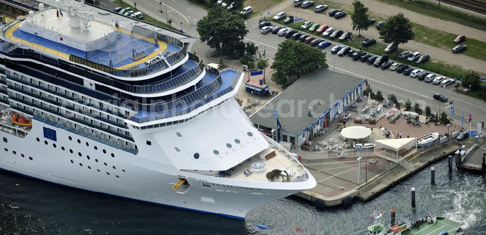 Rostock - Warnemünde from the bird's eye view: Blick auf den Kreuzfahrt - Hafen in Warnemünde mit dem Passagierschiff COSTA ATLANTICA . Die Costa Atlantica ist ein Kreuzfahrtschiff der Reederei Costa Crociere. Das Einsatzgebiet des 290m langen Luxusliners ist im Sommer das Nordland und die Ostsee. View of the Cruise - Port of Rostock - Warnemünde with the passenger ship COSTA ATLANTICA. The Costa Atlantica is a cruise ship for Costa Crociere.