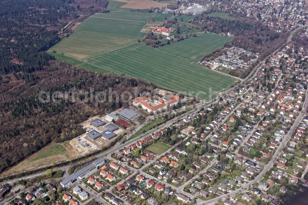 Aerial image Pullach im Isartal - Pater-Rupert-Mayer School center of the Archdiocese of Munich-Freising with construction site of the new building of the primary school, kindergarten and day-care center and grammar school in Pullach near Munich in the state of Bavaria