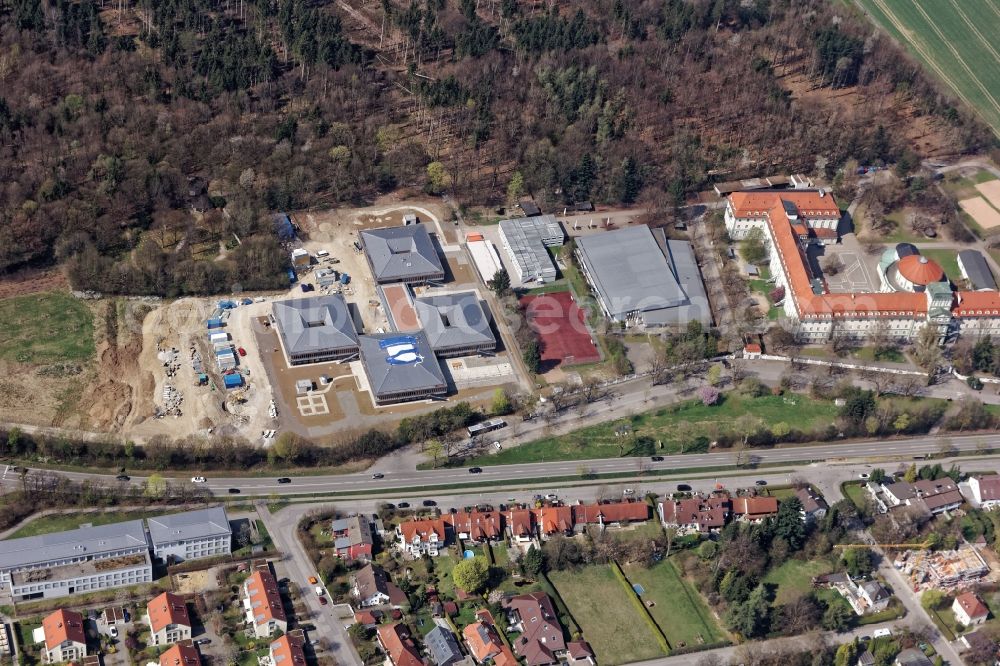 Pullach im Isartal from above - Pater-Rupert-Mayer School center of the Archdiocese of Munich-Freising with construction site of the new building of the primary school, kindergarten and day-care center and grammar school in Pullach near Munich in the state of Bavaria