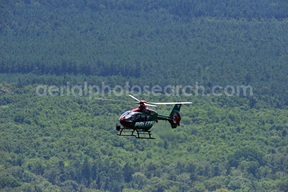 Aerial photograph Graal-Müritz - Patrouillenflug des Polizeihubschraubers / Hubschrauber / Helikopter Merlin 2 vom Typ Eurocopter EC 135P-1 mit der Kennung D-HMVP der Staffel in Mecklenburg-Vorpommern. Patrol flight of the police helicopter Merlin 2 in Mecklenburg-Western Pomerania.