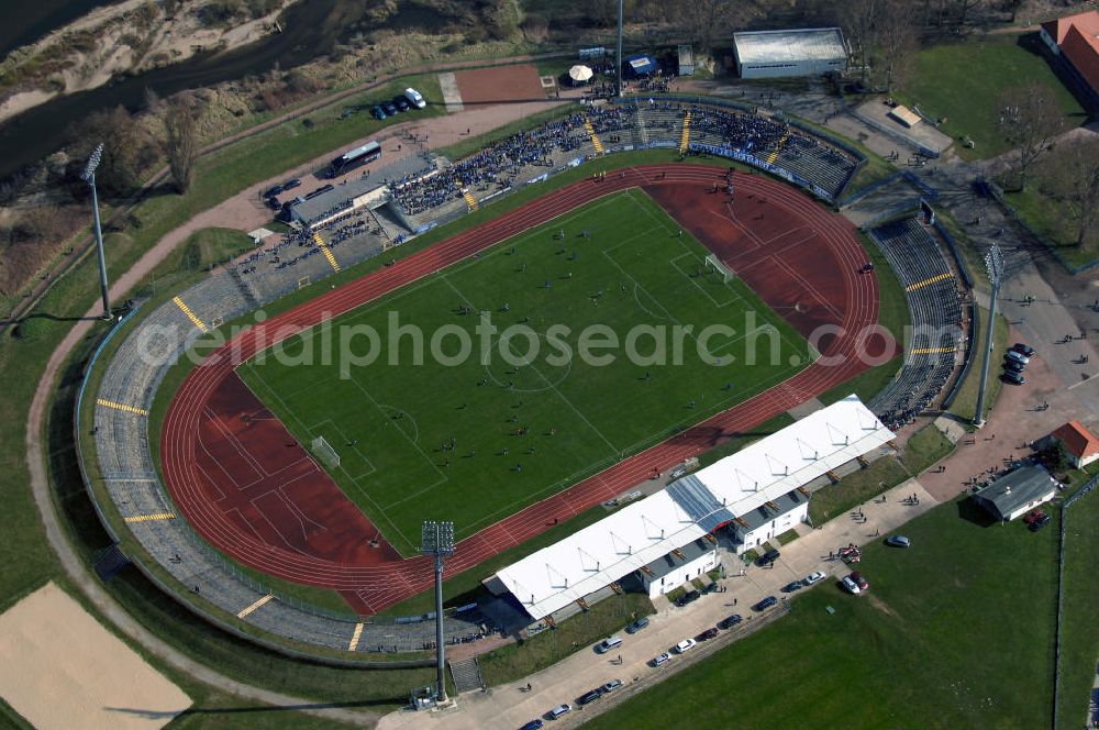 Aerial photograph Dessau - Roßlau - Blick auf das Paul-Greifzu-Stadion. Es ist ein Mehrzweckstadion welches 1952 eröffnet und 1997,2002 und 2004 saniert wurde. Die Kapazität besteht aus 18.000 Stehplätzen und 2.000 Sitzplätzen. Es beherbergt die Vereine SV Dessau 05, LAC Dessau und FC Anhalt Dessau e.V. Das Stadion gehört der Stadt Dessau-Roßlau. Kontakt: Ludwigshafener Strasse 69, 06842 Dessau, Tel. +49(0)340 882 2020