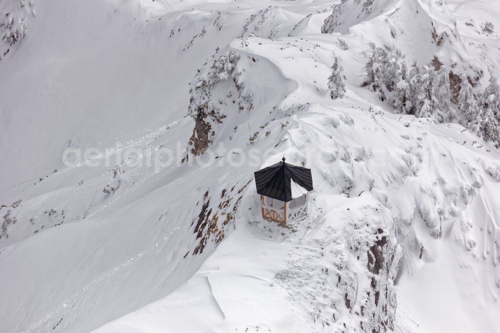 Kirchdorf in Tirol from above - Pavilion on the wintry snowy summit of the mountain Stripsenkopf in the Kaisergebirge in the northern Kalkalpen near Kirchdorf in the province of Tyrol