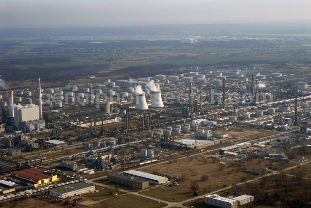 Aerial photograph Schwedt - Blick auf die PCK Raffinerie in Schwedt / Oder in Brandenburg. Das Erdölverarbeitungswerk wurde bereits im Januar 1959 gegründet und verarbeitet seit dem Rohöl zu Mineralöl - und petrochemischen Produkten. Kontakt: PCK Raffinerie GmbH, Passower Chaussee 111, 16303 Schwedt / Oder, Tel. +49(0)3332 46 0, Fax +49(0)3332 46 5480, Email: info@pck.de