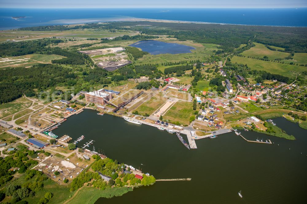 Aerial photograph Peenemünde - Industrial monument and museum of technical systems and models on the grounds of the Historisch-Technisches Museum Peenemuende on the harbor basin of the Peene river in Peenemuende on the island of Usedom in the state Mecklenburg - Western Pomerania, Germany