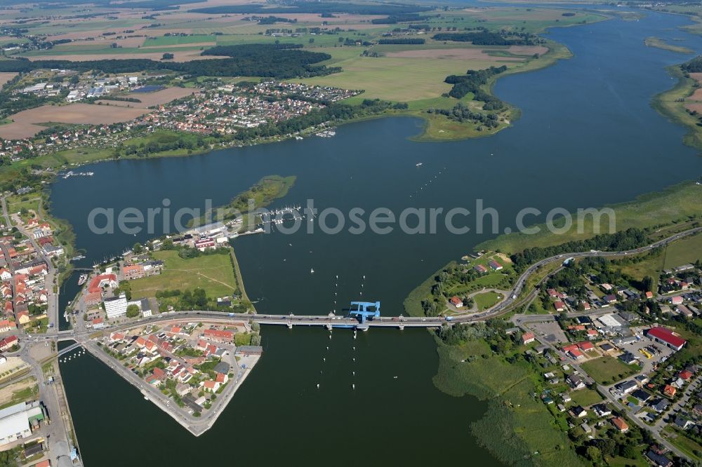 Wolgast from the bird's eye view: View of the Peene Bridge in Wolgast in the state Mecklenburg-Vorpommern. The Peene Bridge is a bascule bridge and crosses the Peenestream. The bridge bears the name Bridge of friendship