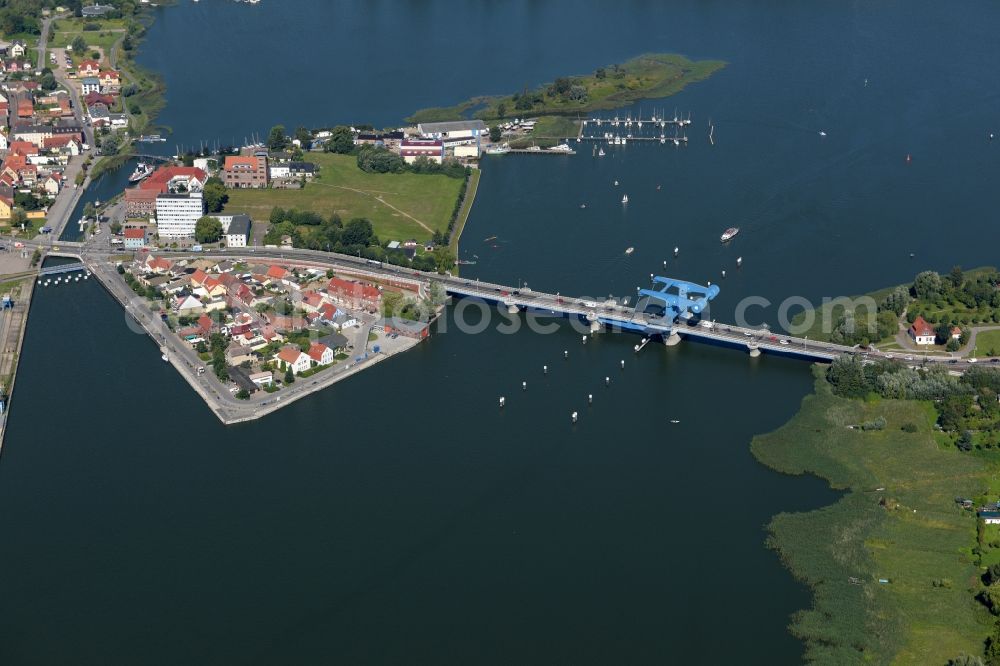 Wolgast from the bird's eye view: View of the Peene Bridge in Wolgast in the state Mecklenburg-Vorpommern. The Peene Bridge is a bascule bridge and crosses the Peenestream. The bridge bears the name Bridge of friendship