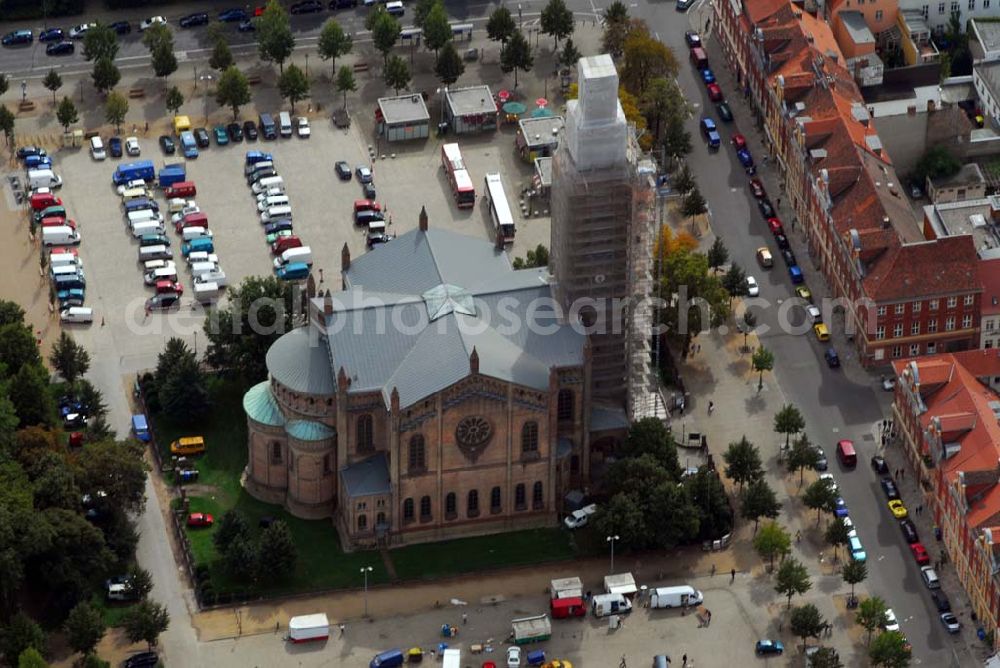 Aerial photograph Potsdam - Blick auf die Peter- und Pauls-Kirche. Am östlichen Ende der Brandenburger Straße steht der monumentale Kirchenbau, der den Bassinplatz im Zentrum Potsdams beherrscht. Mitte des 19. Jahrhunderts wuchs die Gemeinde der Potsdamer Katholiken, für die Friedrich Wilhelm IV. dem berühmten Kirchenbaumeister Friedrich August Stüler den Auftrag erteilte, eine Kirche zu entwerfen.