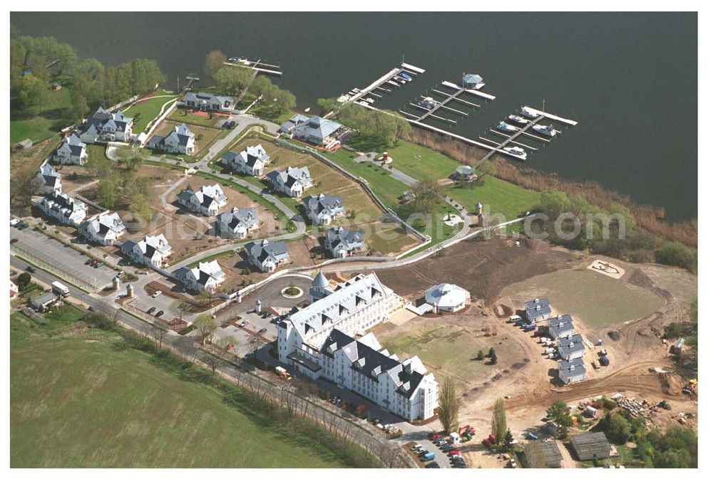 Aerial image Petzow - Petzow (zu Werder in Brandenburg) Ein Yachthafen, ein Hotel, exklusive Ferienhäuser, erstklassige Gastronomie, ein umfassendes Wellness- und Sportangebot und nicht zuletzt die attraktive Nähe zu Potsdam, Berlin und der Inselstadt Werder - das sind die Zutaten für einen erholsamen, erfrischenden, einzigartigen Urlaub. Resort Schwielowsee ,Am Schwielowsee 117,14542 Werder OT Petzow ,Telefon: 0 33 27. 56 96 0,Telefax: 0 33 27. 56 96 999