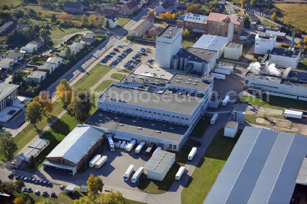 Aerial image Stavenhagen - View at the Pfanni factory premises and the company own power plant in Stavenhagen in the federal state Mecklenburg-Vorpommern. The Pfanni GmbH & Co. OHG is a German food company headquartered in Stavenhagen, which is specialized in the manufacture of kitchen-ready potato products. The power plant was built for the power and heating supply of the Pfanni company and is operated with alternative fuels. Operator is the Nehlsen Heizkraftwerke GmbH & Co.KG