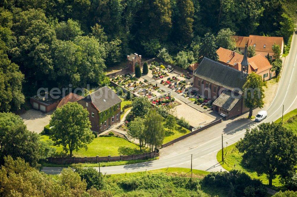 Kamp-Lintfort from above - The parish church Saint Mariae Himmelfahrt with the cemetery in the district Eyll on the Eyller Strasse in Kamp-Lintfort in the state North Rhine-Westphalia