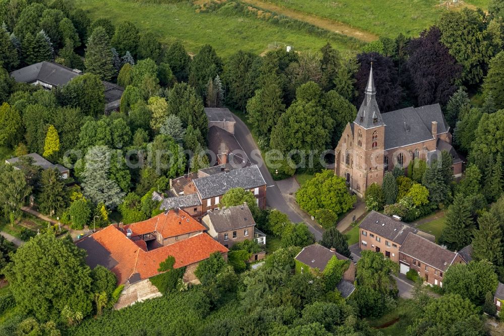 Erkelenz OT Borschmich from the bird's eye view: View of Parish St.Martinus in Borsch me, the discontinued district of Erkelenz on the edge of lignite mining Garzweiler I at Erkelenz in the state of North Rhine-Westphalia