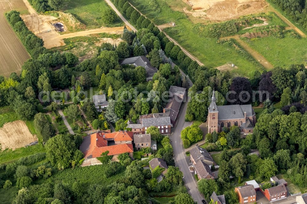 Aerial image Erkelenz OT Borschmich - View of Parish St.Martinus in Borsch me, the discontinued district of Erkelenz on the edge of lignite mining Garzweiler I at Erkelenz in the state of North Rhine-Westphalia