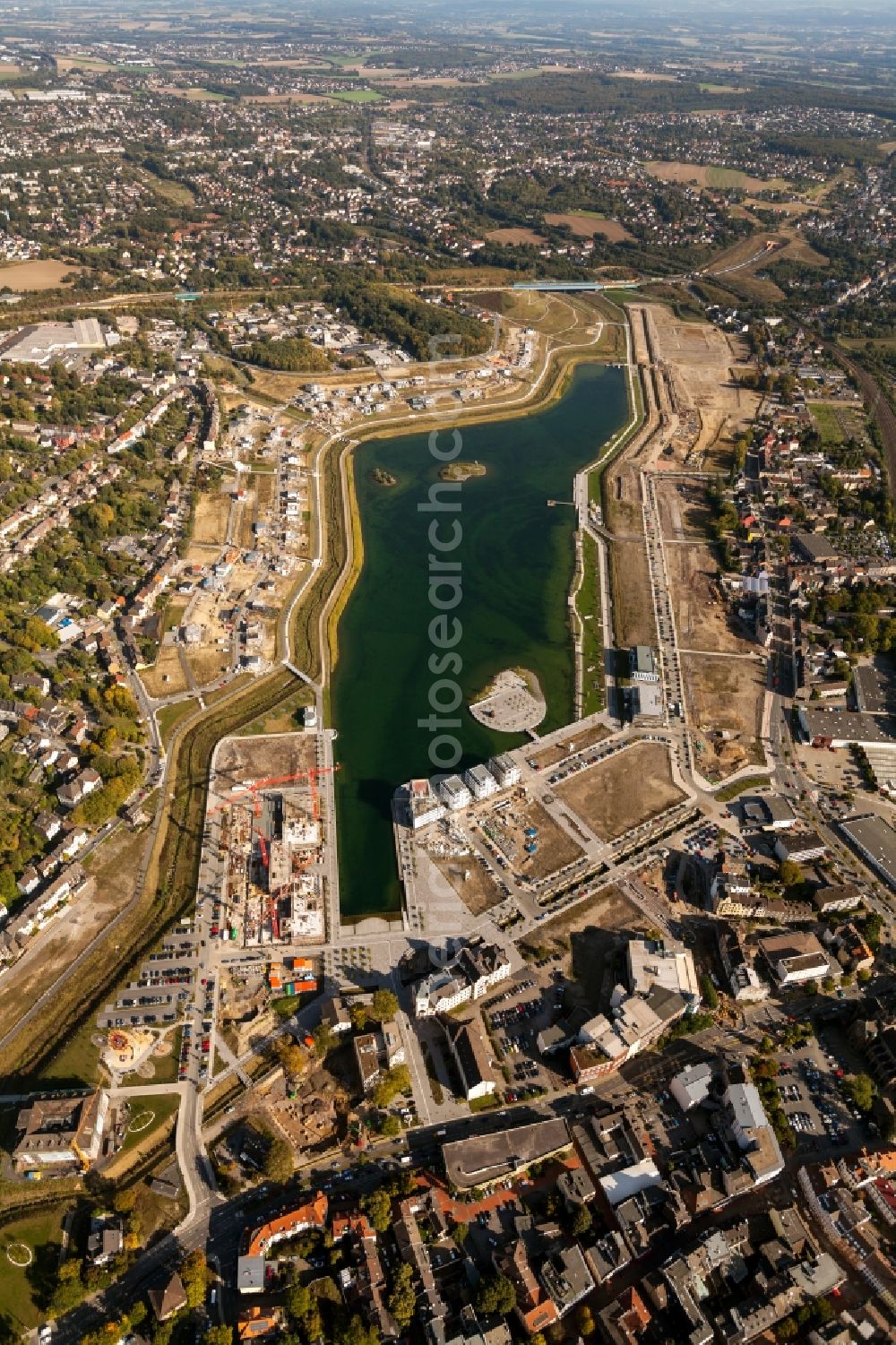 Aerial image Dortmund - View of the Lake Phoenix in Dortmund in the state North Rhine-Westphalia. The Lake Phoenix is an artificial lake on the area of the former steelwork Phoenix-Ost. Together with the circumjacent areal a housing area and a recreational area will be created