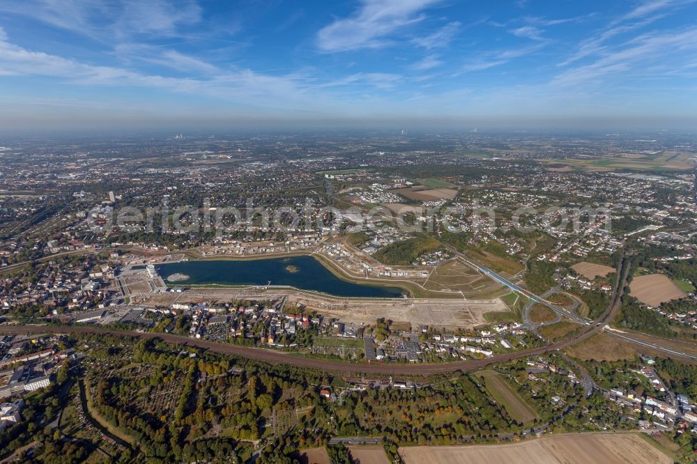 Dortmund from above - View of the Lake Phoenix in Dortmund in the state North Rhine-Westphalia. The Lake Phoenix is an artificial lake on the area of the former steelwork Phoenix-Ost. Together with the circumjacent areal a housing area and a recreational area will be created