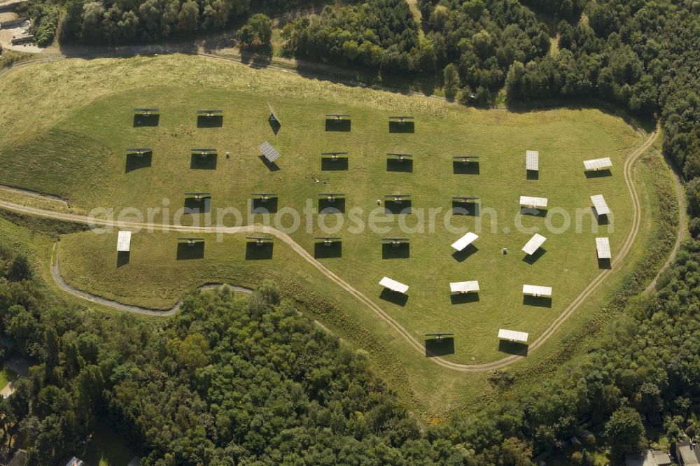 Bottrop from above - View of the photovoltaic power plant on the former landfill on Südring in Bottrop in the state North Rhine-Westphalia. The plant provides the car park of the waste disposal firm BEST with energy