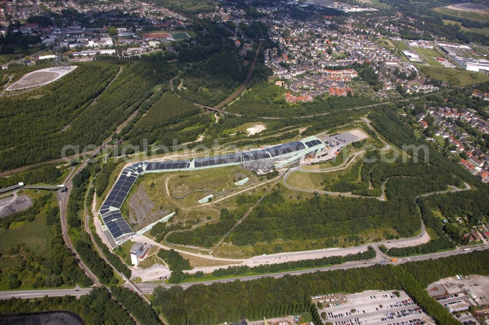 Bottrop from above - Photovoltaic system - solar power plant on the roof of the summer toboggan run on the heap in Bottrop in North Rhine-Westphalia