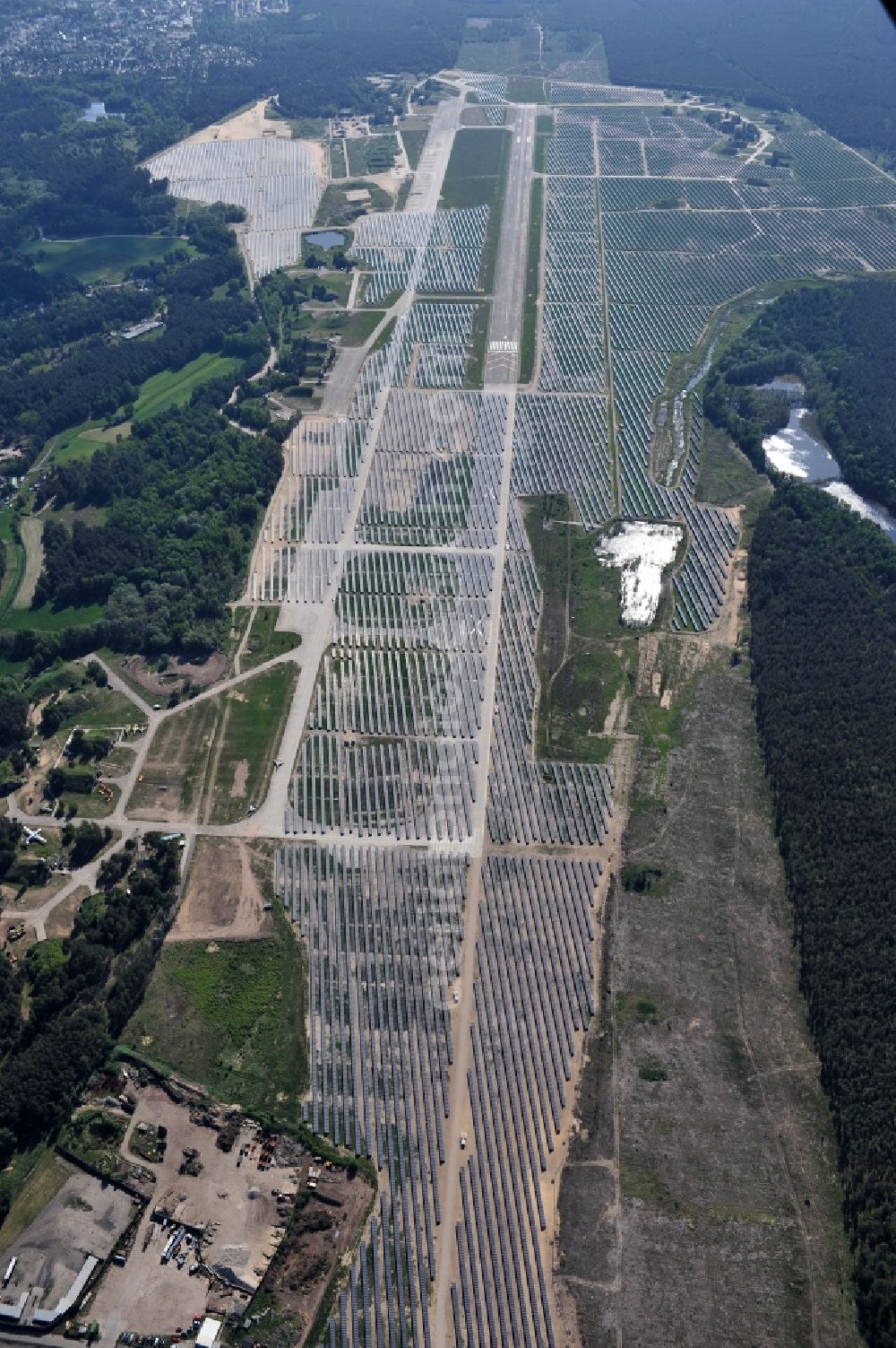 Eberswalde - Finowfurt from the bird's eye view: View of the almost fully assembled solar fields of the new solar power plant Finow Tower. The hybrid solar AG is currently building on the former military airport, a solar power plant