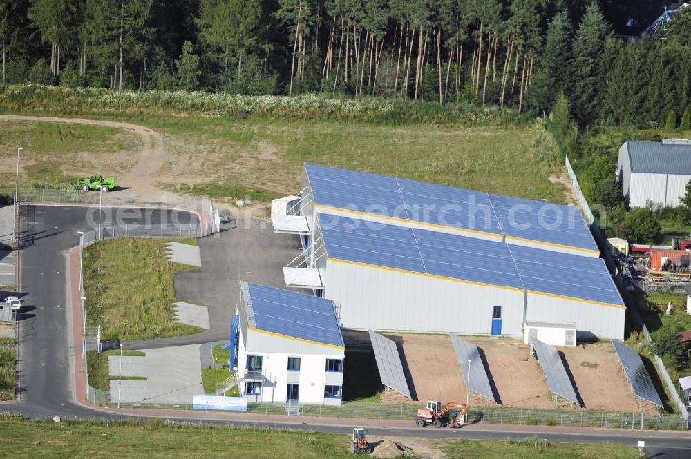 Großostheim OT Ringheim from above - Großostheim 07/23/2012 view of a photovoltaic / solar power plant as a combination of open spaces and roof systems in the industrial park Großostheim in state of Bavaria. A project of Conecon GmbH