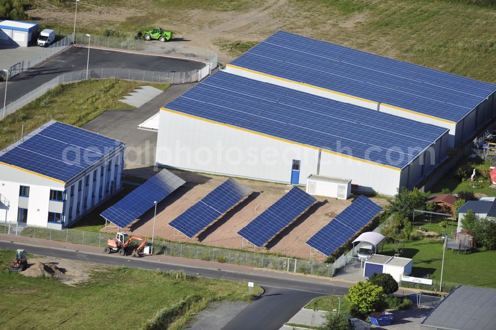 Aerial image Großostheim OT Ringheim - Großostheim 07/23/2012 view of a photovoltaic / solar power plant as a combination of open spaces and roof systems in the industrial park Großostheim in state of Bavaria. A project of Conecon GmbH