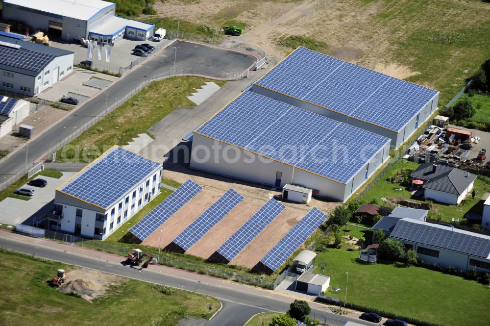 Aerial image Großostheim OT Ringheim - Großostheim 07/23/2012 view of a photovoltaic / solar power plant as a combination of open spaces and roof systems in the industrial park Großostheim in state of Bavaria. A project of Conecon GmbH