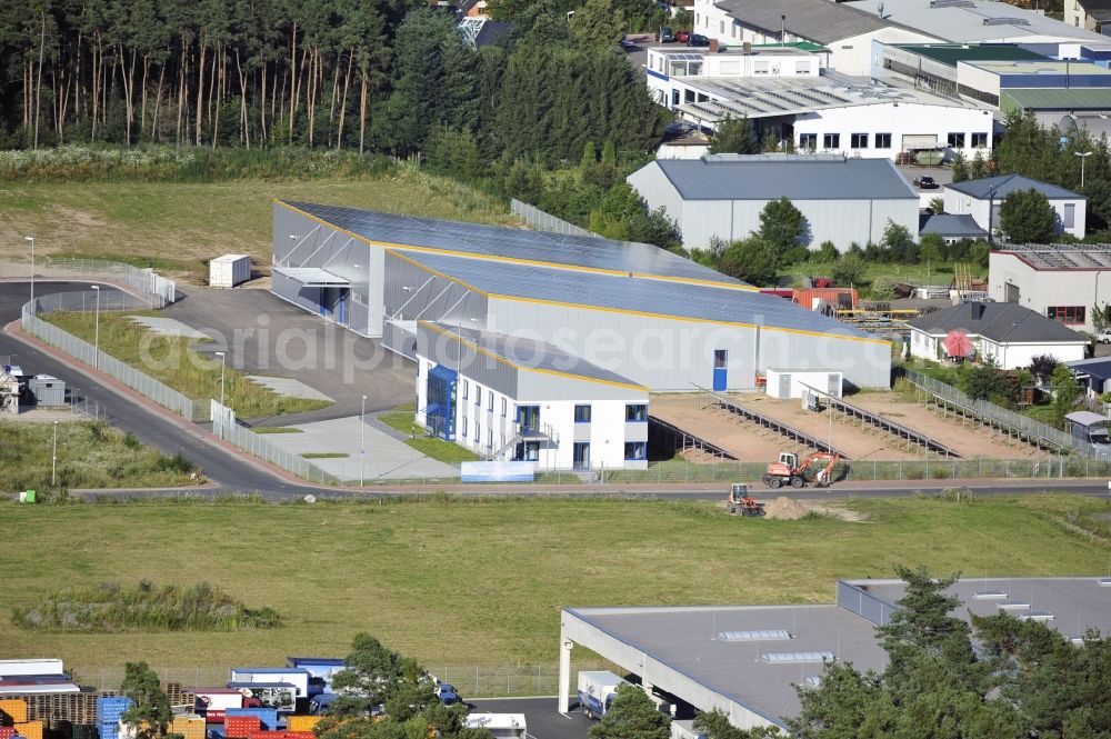 Aerial image Großostheim OT Ringheim - Großostheim 07/23/2012 view of a photovoltaic / solar power plant as a combination of open spaces and roof systems in the industrial park Großostheim in state of Bavaria. A project of Conecon GmbH