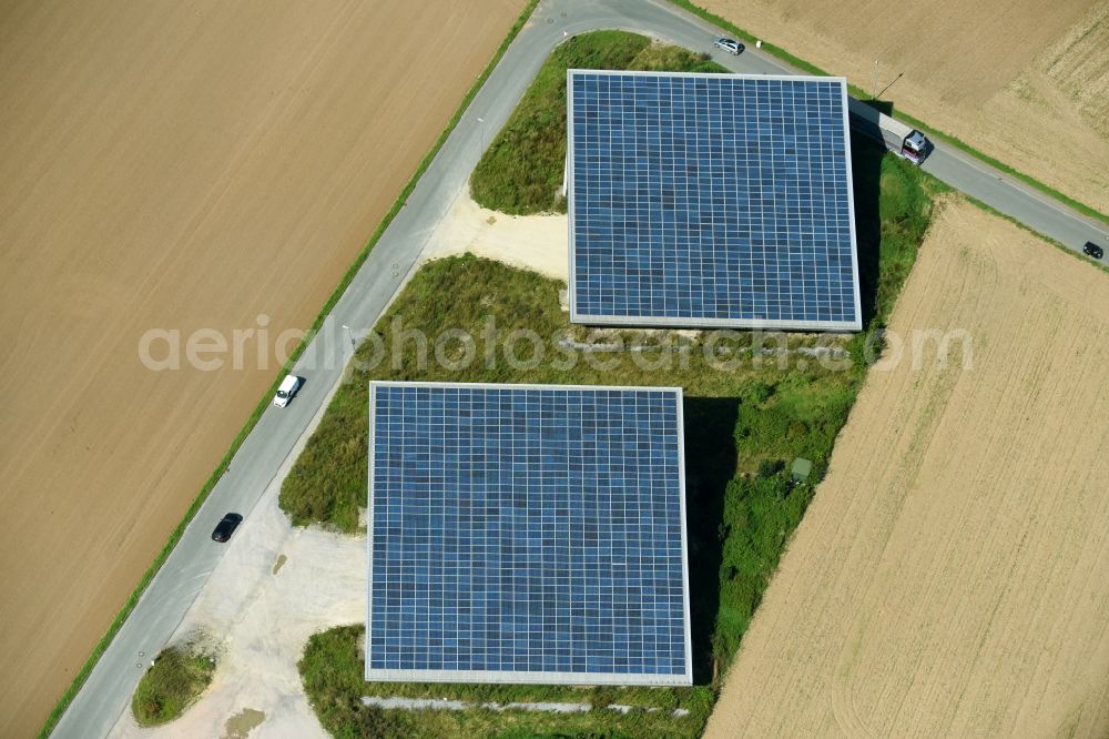 Warburg from the bird's eye view: Photovoltaic plant on the street Zum Heidhof in Warburg, North Rhine-Westphalia, Germany