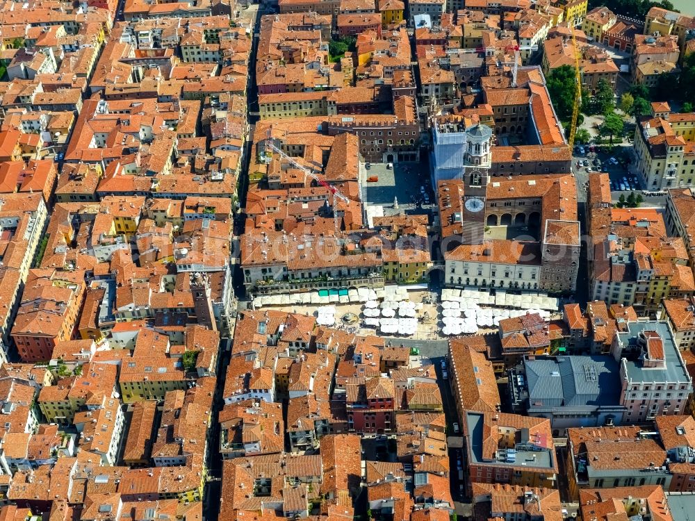 Aerial image Verona - Ensemble space Piazza delle Erbe in the inner city center in Verona in Veneto, Italy