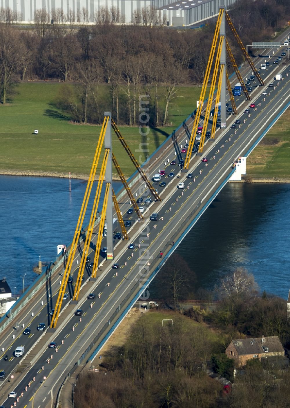 Duisburg from the bird's eye view: Pylons of the motorway bridge over the Rhine crossing Beekerwerth the A42 motorway in Duisburg in North Rhine-Westphalia