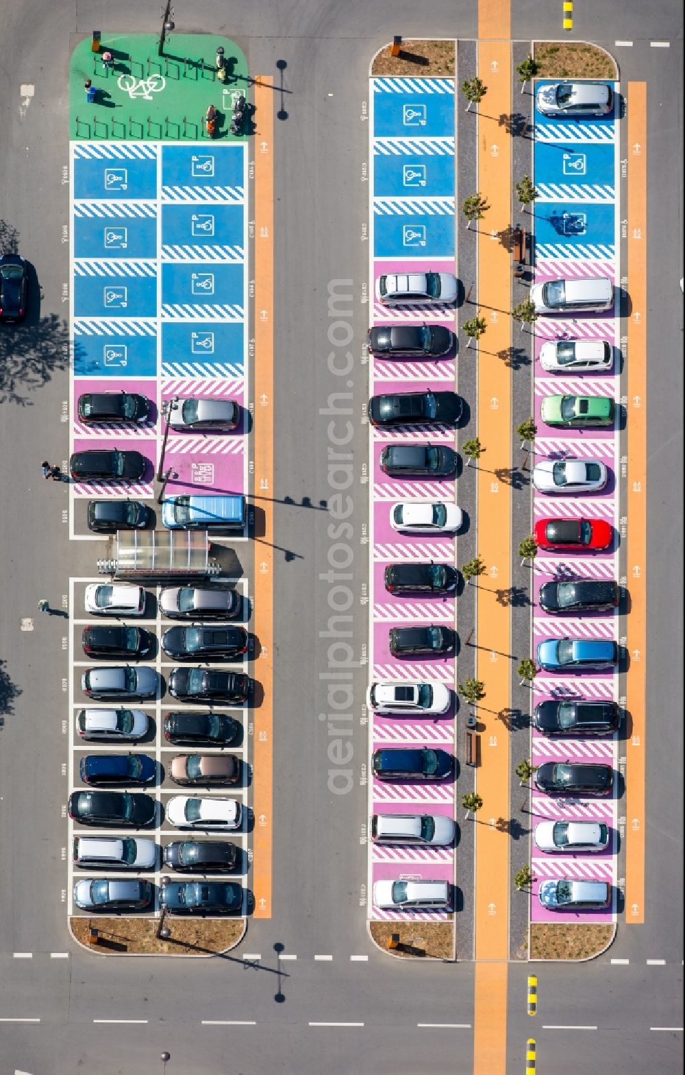 Bochum from above - Hot pink color-coded rows of women parking and disabled parking spaces in the parking lot for automobiles at the Ruhr Park shopping center in Bochum in North Rhine-Westphalia