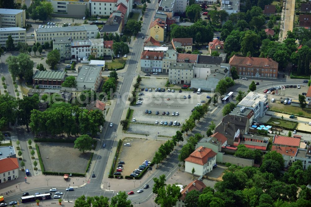 Oranienburg from above - Automobile and automotive parking- area in Oranienburg in the state Brandenburg. GVG Project Development Company plans on open-space land an urban development with a local supply and service center