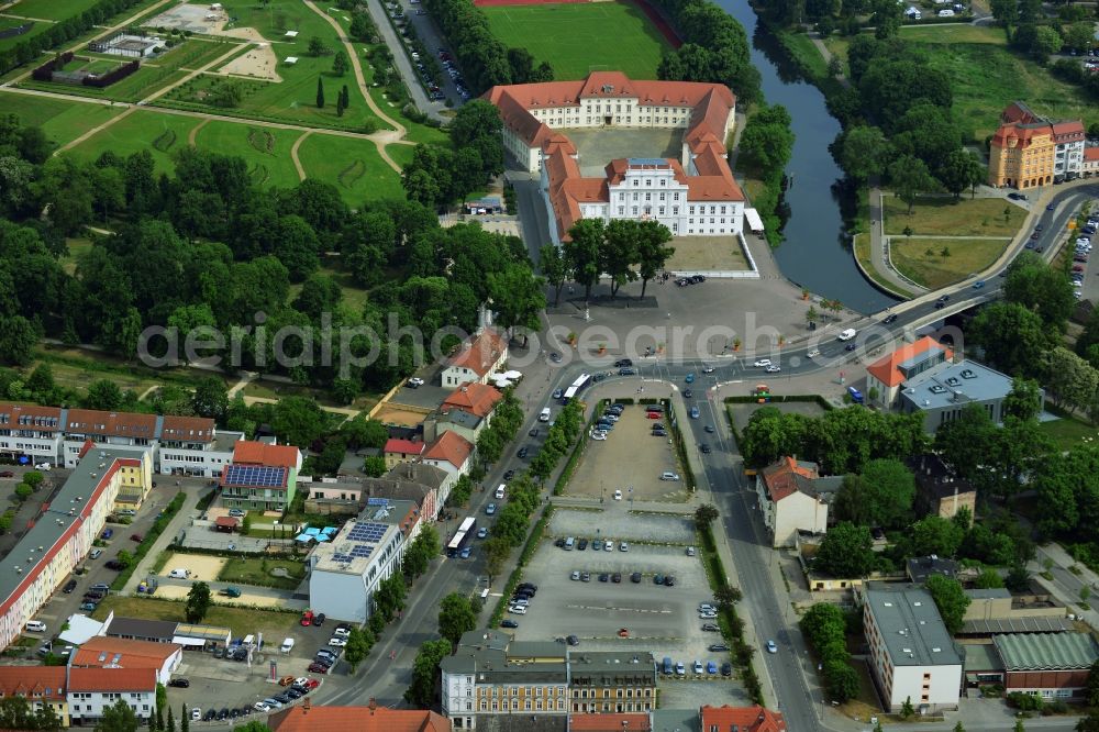 Aerial image Oranienburg - Automobile and automotive parking- area in Oranienburg in the state Brandenburg. GVG Project Development Company plans on open-space land an urban development with a local supply and service center