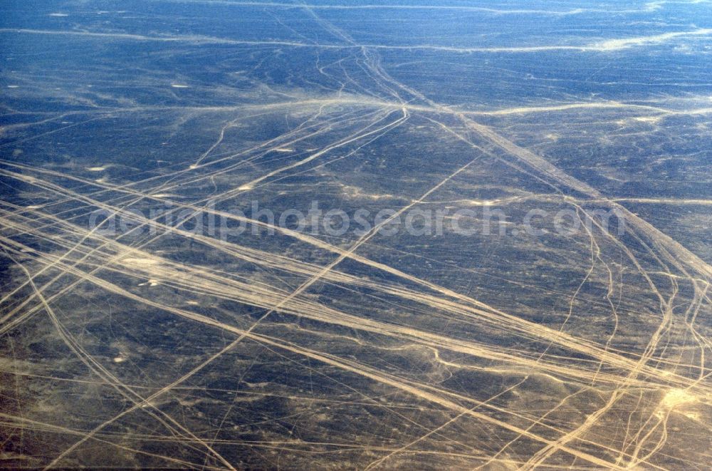 Aerial image Ain Salah - The Plateau Tandemit in the north of In Salah covered with ash in Algeria