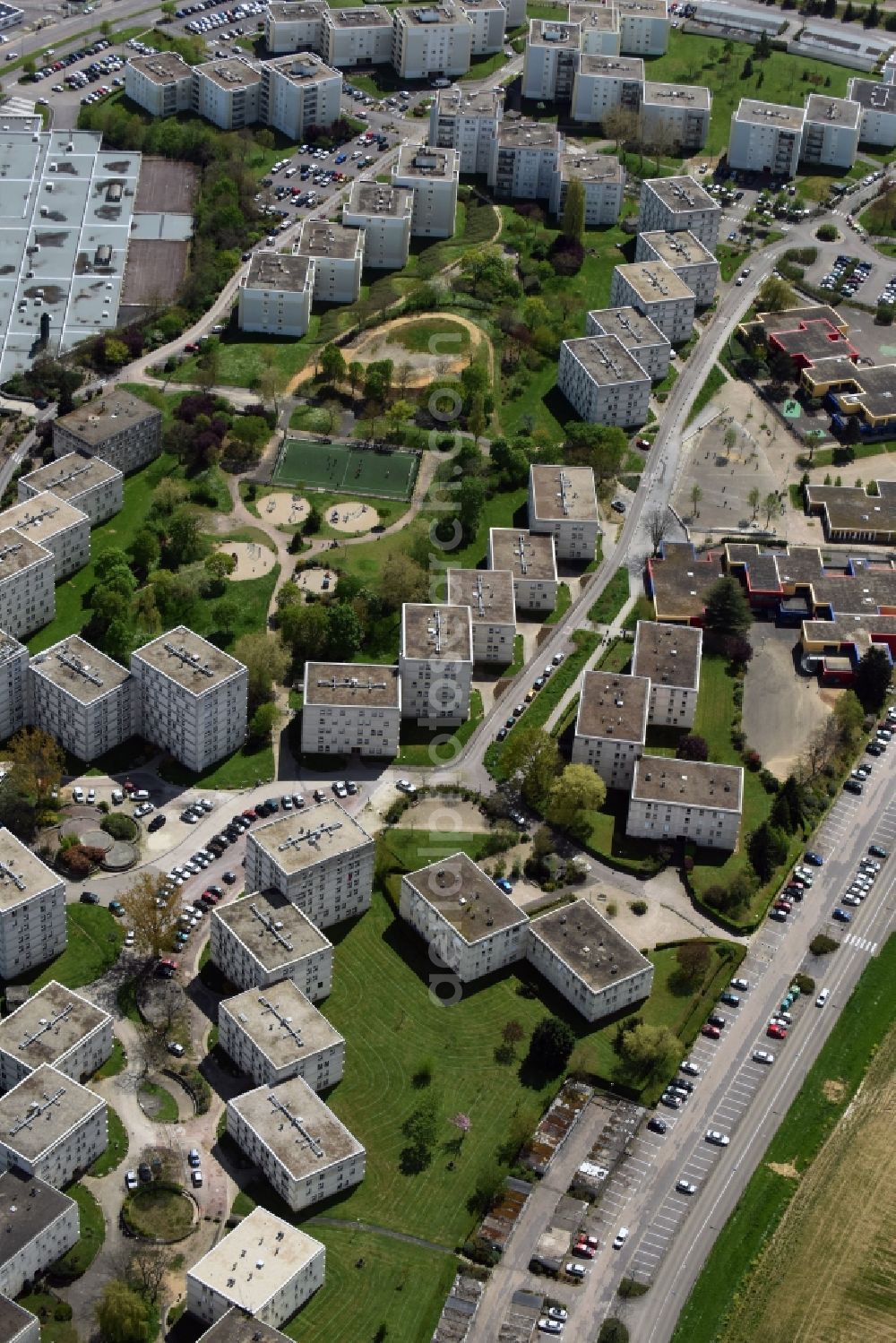 Auxerre from above - Skyscrapers in the residential area of industrially manufactured settlement in Auxerre in Bourgogne Franche-Comte, France