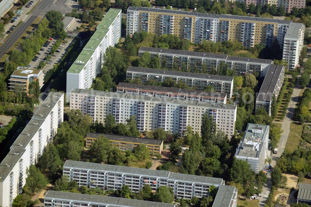 Berlin from the bird's eye view: Skyscrapers in the residential area of industrially manufactured settlement at the Maerkische Allee near the trainstation Raoul-Wallenberg-Str. in Berlin in Germany