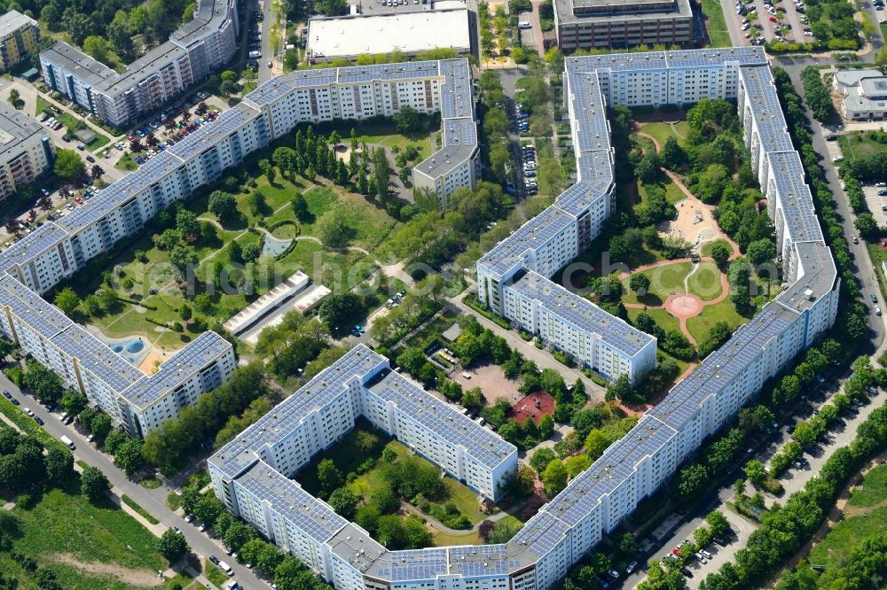 Berlin from above - Skyscrapers in the residential area of industrially manufactured settlement Carola-Neher-Strasse - John-Heartfield-Strasse in the district Hellersdorf in Berlin, Germany