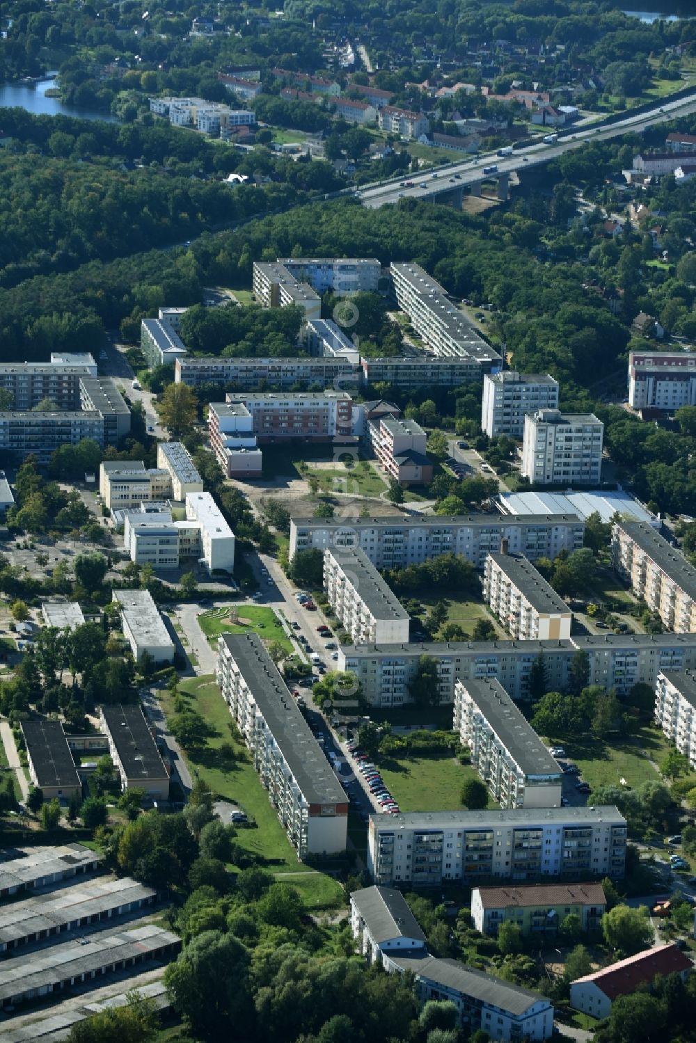 Rüdersdorf from above - Skyscrapers in the residential area of industrially manufactured settlement along the street Friedrich-Engels-Ring in Ruedersdorf in the state Brandenburg