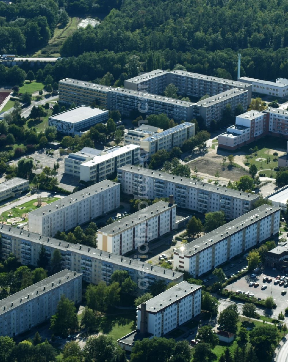 Aerial photograph Rüdersdorf - Skyscrapers in the residential area of industrially manufactured settlement along the street Friedrich-Engels-Ring in Ruedersdorf in the state Brandenburg