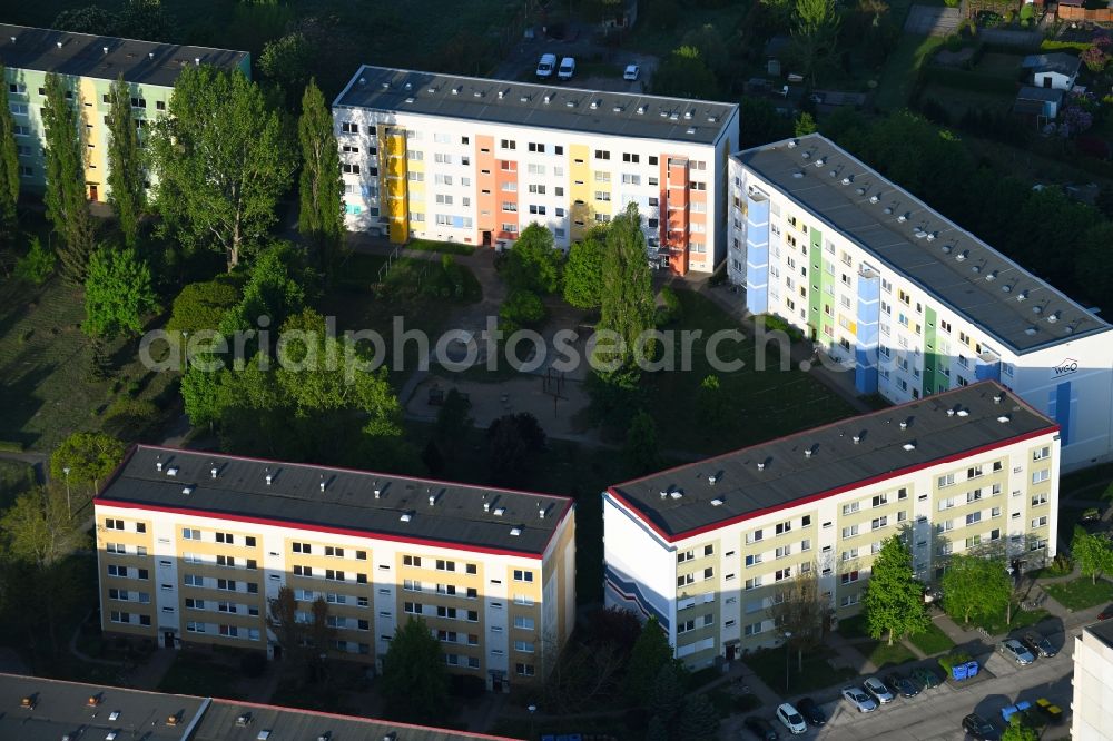 Osterburg (Altmark) from the bird's eye view: Skyscrapers in the residential area of industrially manufactured settlement in Osterburg (Altmark) in the state Saxony-Anhalt, Germany