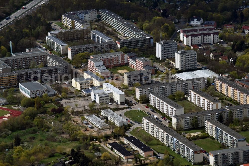 Rüdersdorf from the bird's eye view: Skyscrapers in the residential area of industrially manufactured settlement aloung Brueckenstrasse in Ruedersdorf in the state Brandenburg