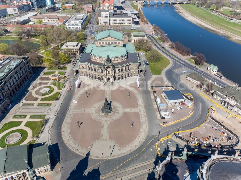 Dresden from above - Ensemble space an place Theaterplatz with memorial Koenig-Johann-Denkmal and thater Semperoper in the inner city center in the district Altstadt in Dresden in the state Saxony, Germany