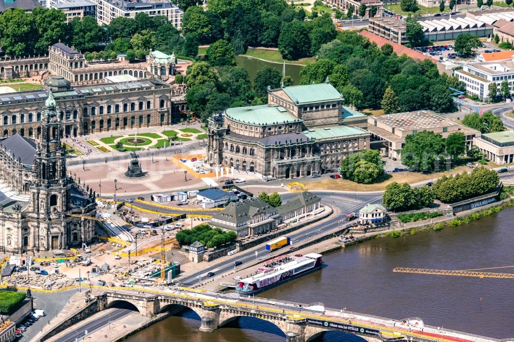 Dresden from the bird's eye view: Ensemble space an place Theaterplatz with memorial Koenig-Johann-Denkmal and thater Semperoper in the inner city center in the district Altstadt in Dresden in the state Saxony, Germany