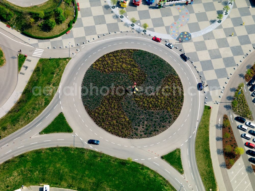 Günzburg from above - Square in front of the theme park Legoland Germany in Guenzburg in the state of Bavaria. The resort was opened in 2002 and is home of several landscapes and attractions built from Lego bricks, as well as parking facilities, an adventure area and the holiday village. The round square is located in front of the main entrance