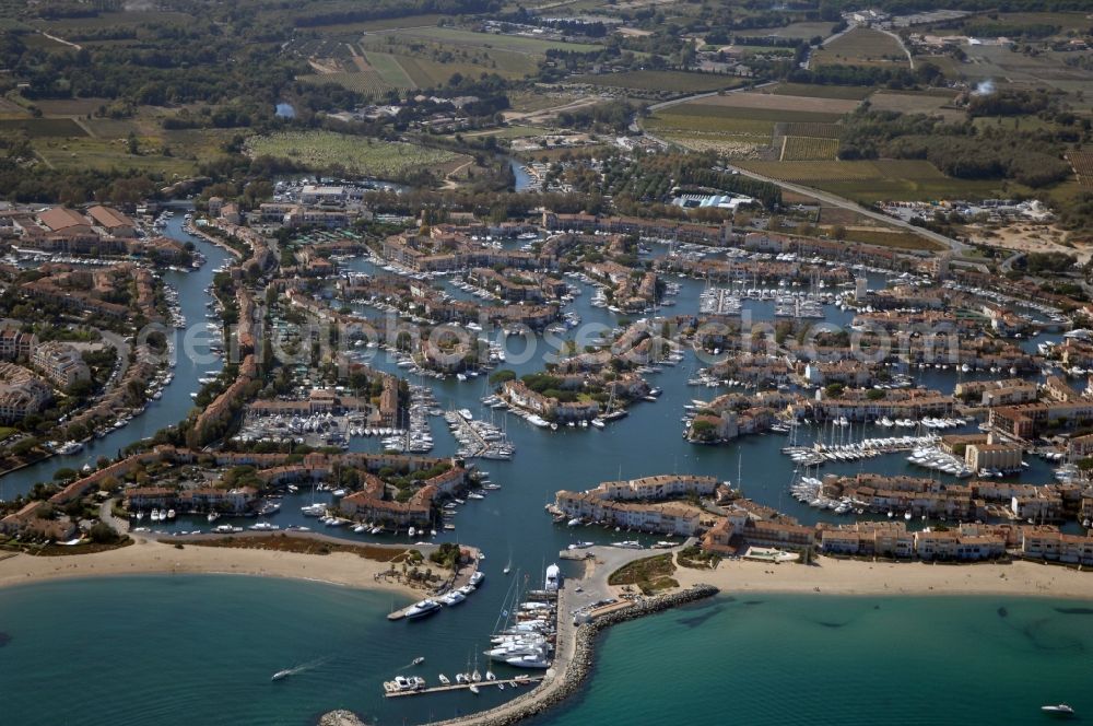 Aerial image Grimaud - Port Grimaud-Marina - harbour area on the shore of Golfe de Saint-Tropez in Grimaud in Provence-Alpes-Cote d'Azur, France