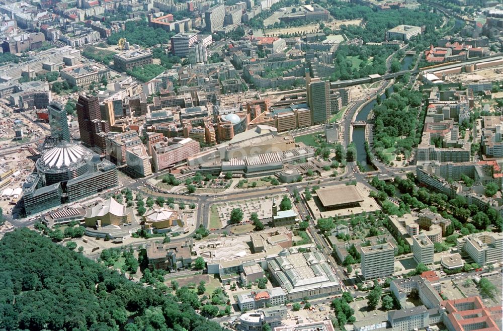 Berlin from above - The Potsdamer Platz with its modern architecture, the Sony Center, the shopping center at Potsdamer Platz Arcades and the Musical Theatre and the Cultural Forum with the State Library, the Philharmonic, the museums and the New National Gallery is an important center of culture, trade and politics in the heart of Berlin-Mitte