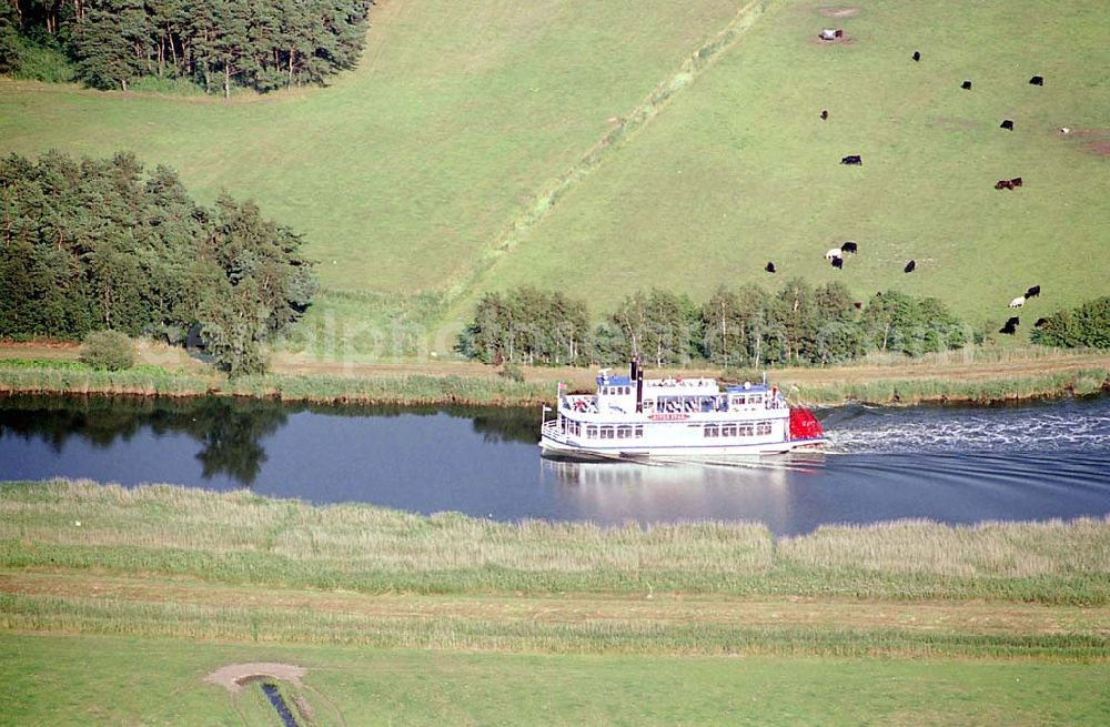 Prerow / Mecklenburg Vorpommern from the bird's eye view: Prerow / Mecklenburg Vorpommern neuer Raddampfer Riverstar der Reederei auf der Fahrt von Bresewitz nach Prerow Poschke Fahrgastschifffahrt GmbH Pumpeneck 5 18375 Born Telefon 03 82 34 / 2 39 Telefax 03 82 34 / 3 01 39 Mobil 0171 / 4 10 04 26 E-Mail: Reederei-Poschke@web.de