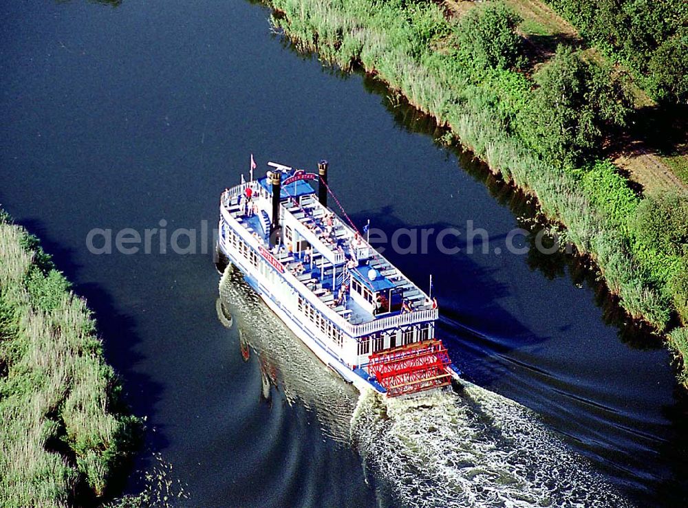 Prerow / Mecklenburg Vorpommern from the bird's eye view: Prerow / Mecklenburg Vorpommern neuer Raddampfer Riverstar der Reederei auf der Fahrt von Bresewitz nach Prerow Poschke Fahrgastschifffahrt GmbH Pumpeneck 5 18375 Born Telefon 03 82 34 / 2 39 Telefax 03 82 34 / 3 01 39 Mobil 0171 / 4 10 04 26 E-Mail: Reederei-Poschke@web.de