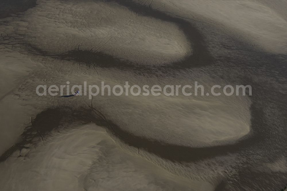 Playa de Isla Canela from the bird's eye view: Formation of tides in the Wadden Sea landscape the Mediterranean sea in Playa de Isla Canela in Andalucia, Spain