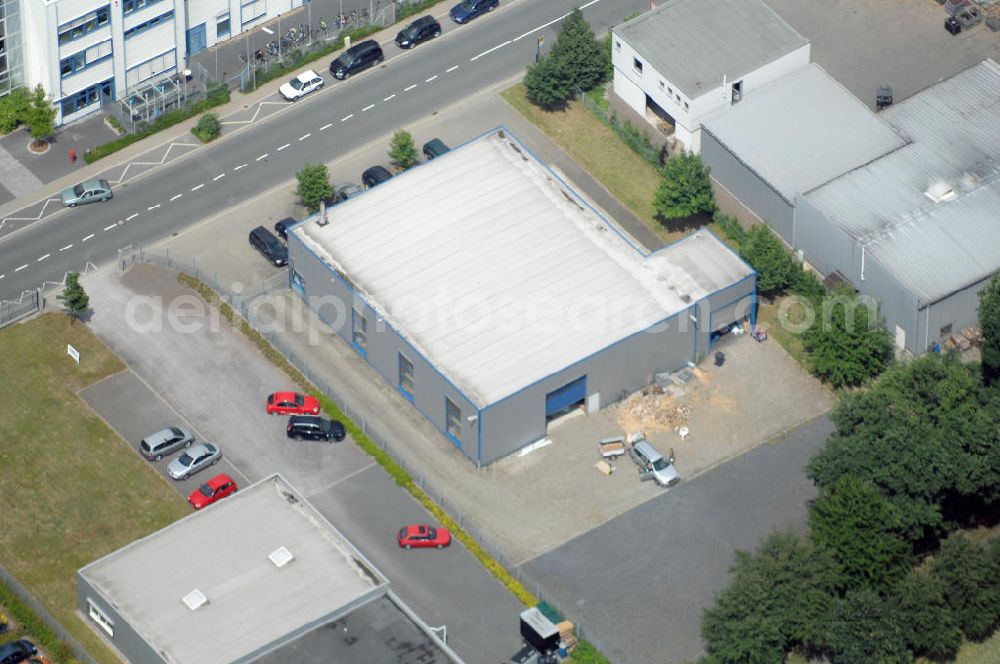 Aerial photograph Bönen - Blick auf eine Produktionshalle mit integriertem Büro und LKW Waage. Adresse: Gewerbegebiet Bönen, Schulstrasse, 59199 Bönen; Vermietung / Verwaltung: Unternehmensgruppe Markus Gerold, An der Vaerstbrücke 1, 59425 Unna, Tel. +49(0)2303 25036-26, Fax +49(0)2303 25036-27, E-Mail: info@markus-gerold.de